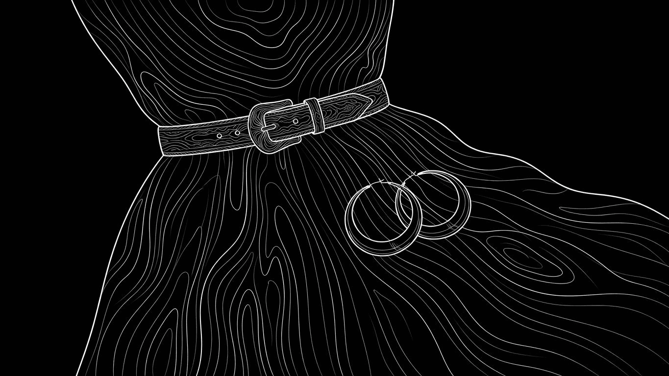 A western belt cinched over an Anarkali kurta with hoop earrings.